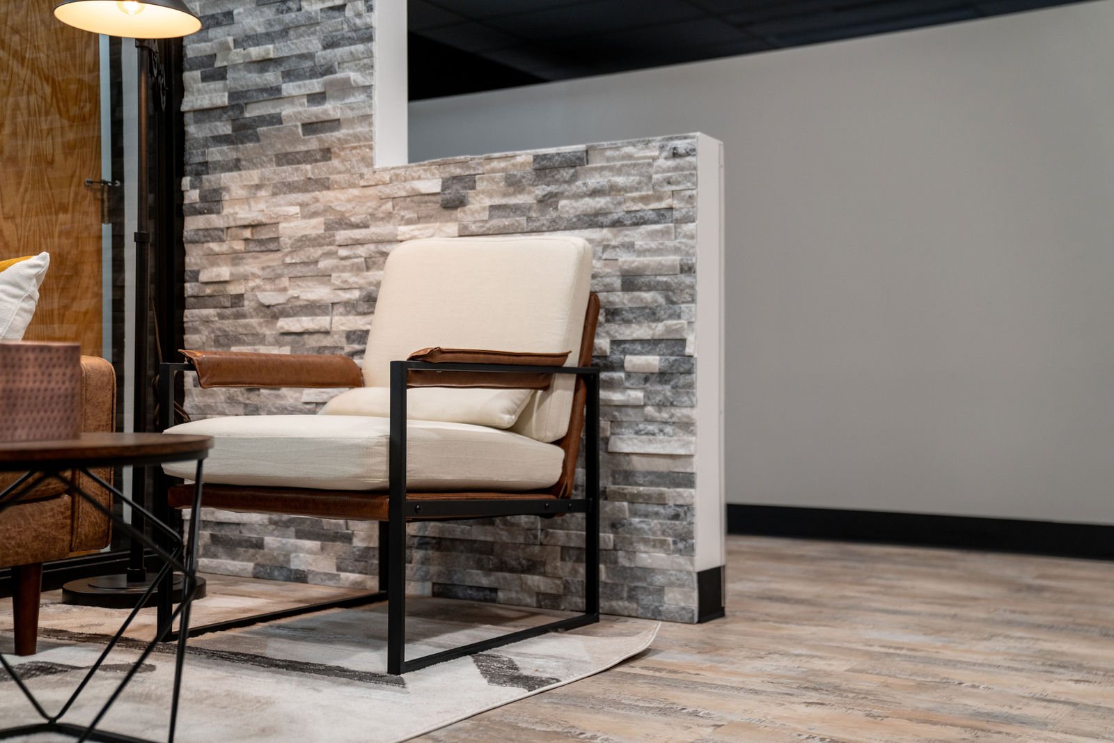 Single chair and table in a stone-walled corner